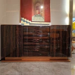 Marble-Top Sideboard Cabinet with Dark Striped Wood Veneer, Rounded Side Doors, and Central Drawer Storage